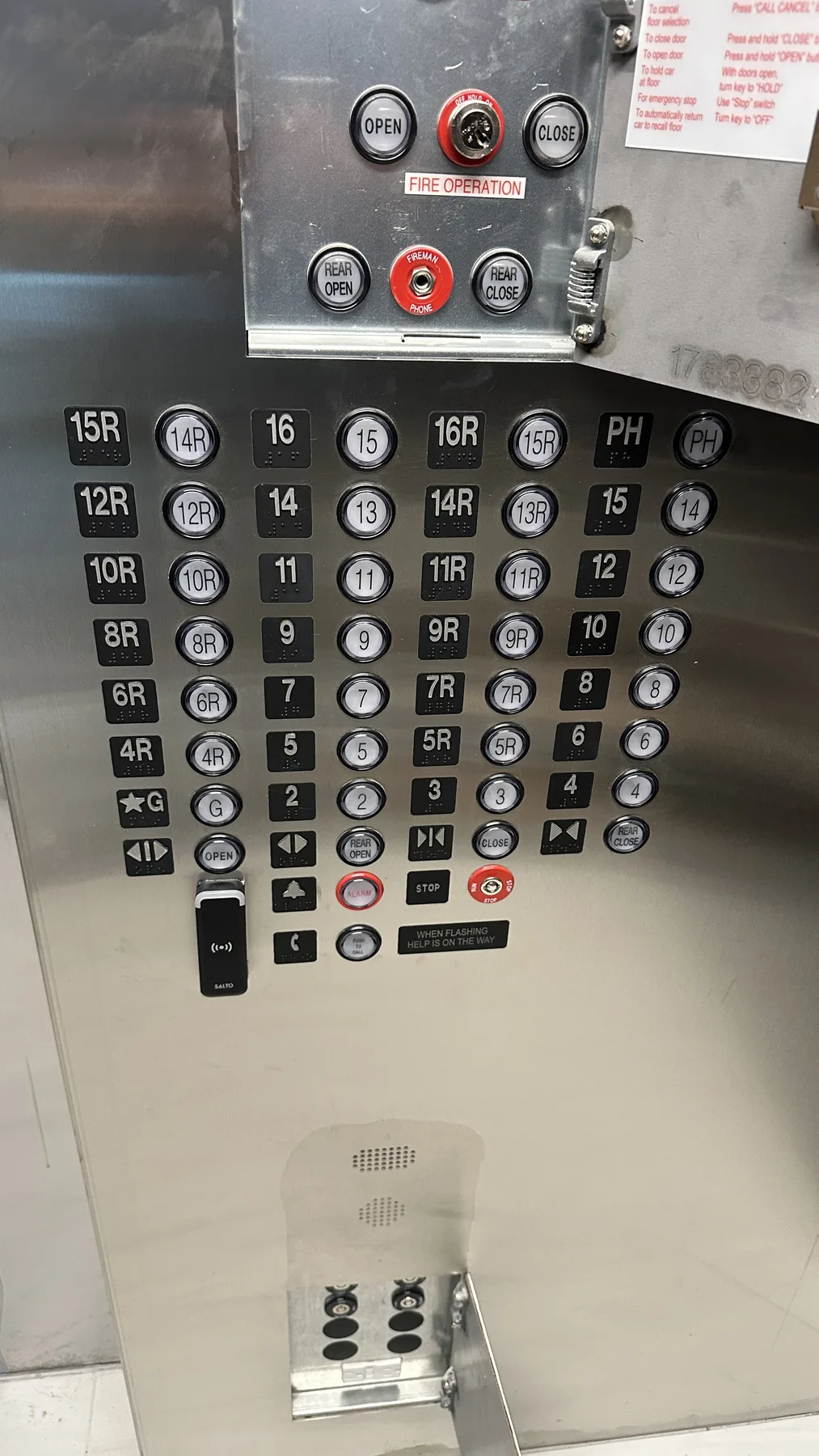 Elevator control panel with rows of buttons
